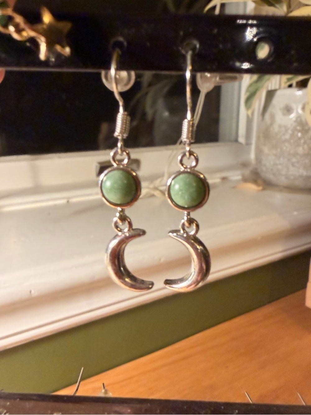 Silver Crescent Moon Drop Earrings with Green Stone